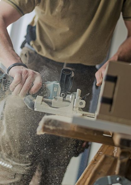 carpenter with saw